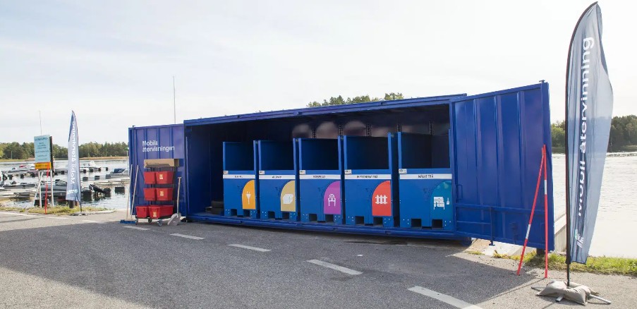 Bottentömmande tippcontainer med dubbelkuggkrans